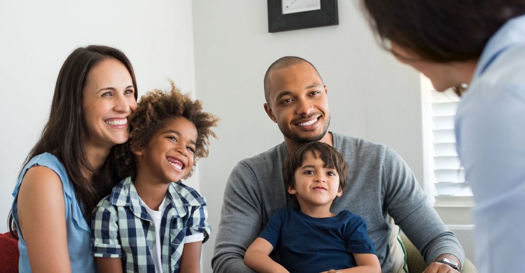 Large header image of a family.